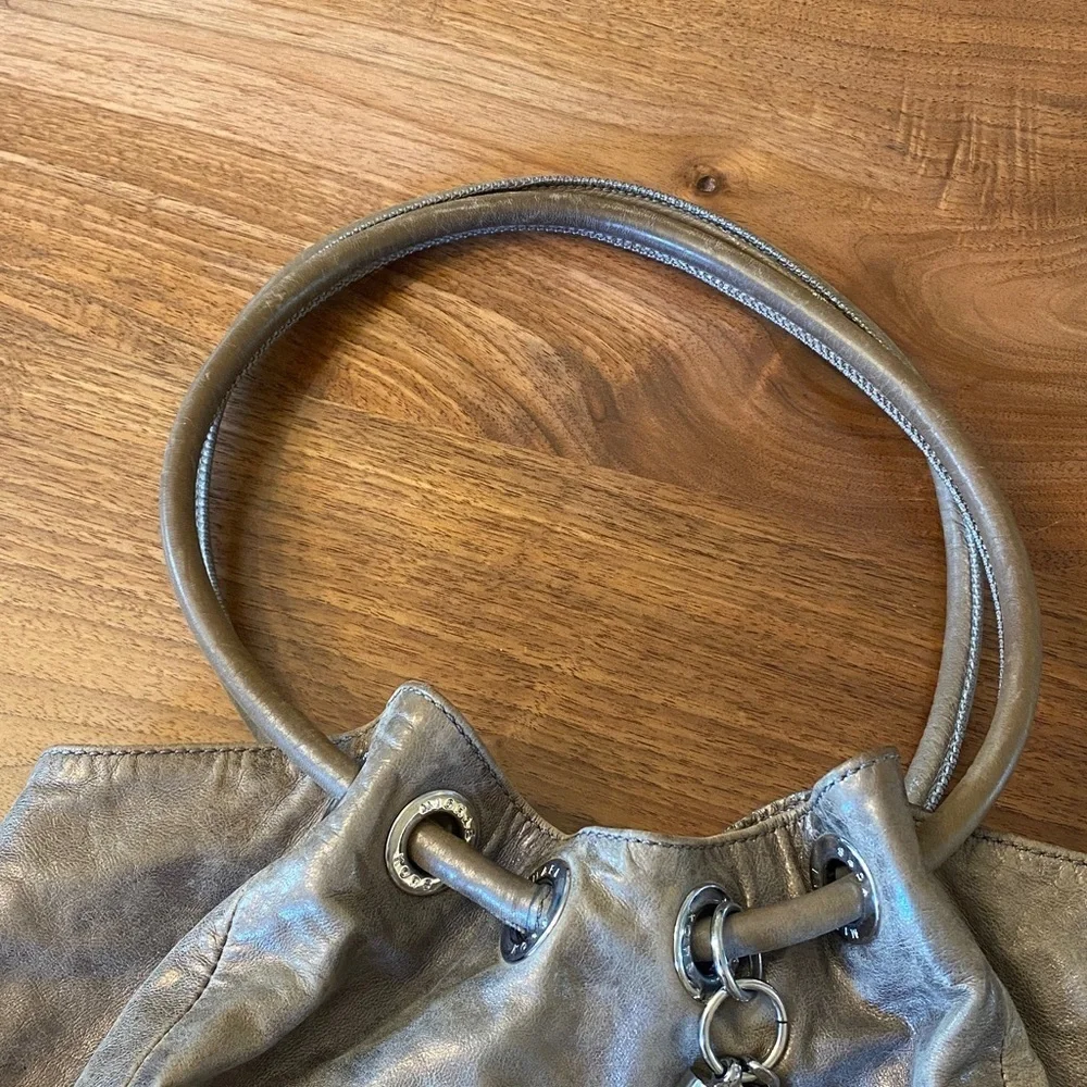 Michael Kors East West Ring Bag in a metallic, distressed leather